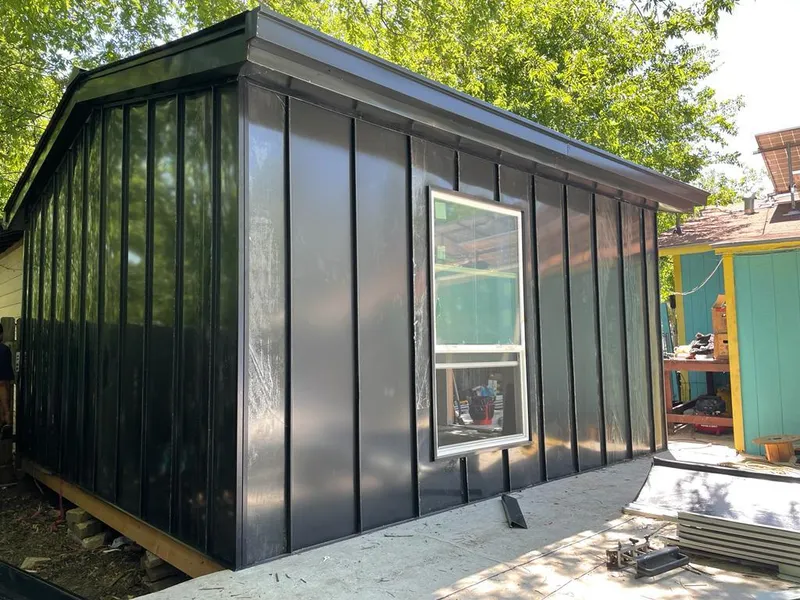 Black standing seam metal wall panels for Roof Inspection in Durango